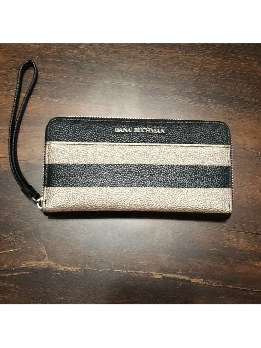 Dana Buchman wristlet, black & gold pebble leather 8"by 4" .